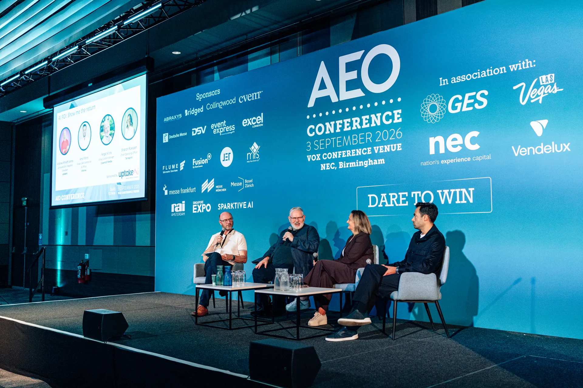 A four-person panel on stage at the AEO Conference, NEC Birmingham, September 2026